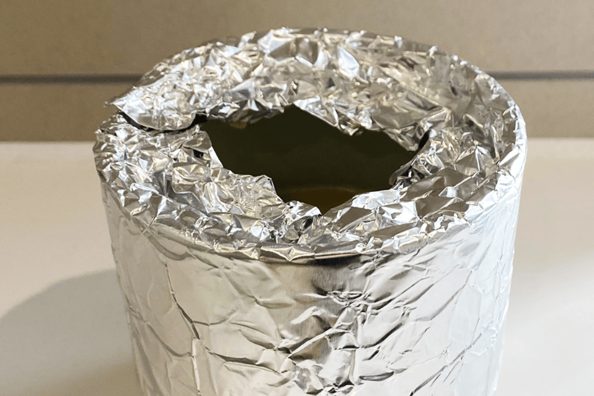 Tunnelled candle fix with foil